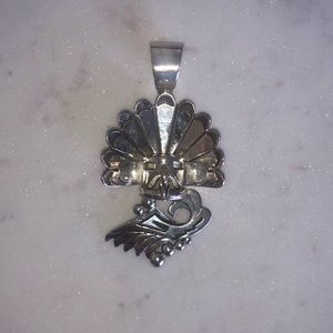 Grandfather eagle Indian pendant